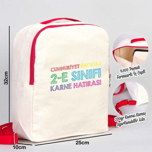 25×32×10 cm ebatlarında, kırmızı fermuarlı okul çantası. Ön yüzünde ürün grubuna ait 18 farklı karne hatırası tasarımından biri bulunur.
