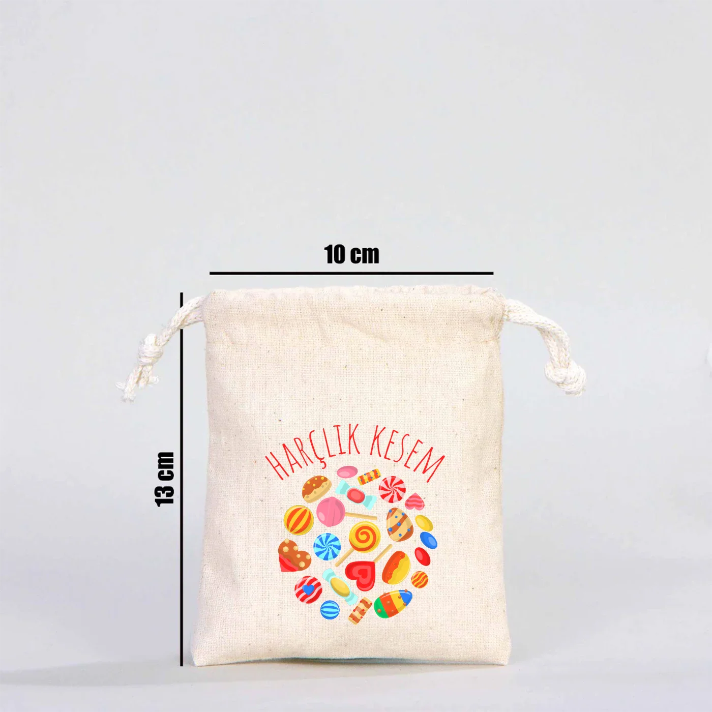10x13 cm ölçülü pamuk büzgülü kese, şeker ve çikolata desenli “Harçlık Kesem” baskılı Ramazan Bayramı hediye kesesi.