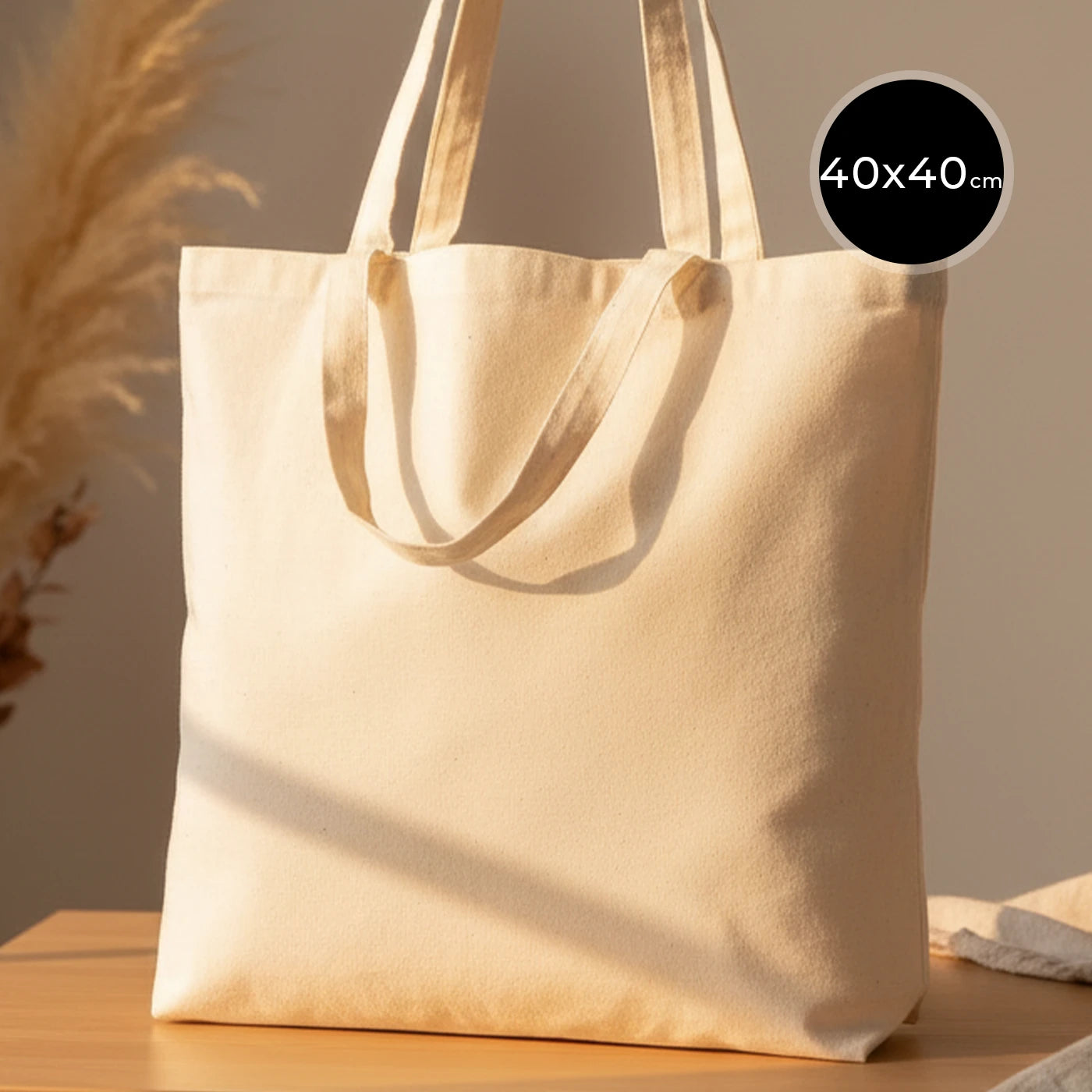 Çift kulplu, dayanıklı ham bez kumaştan üretilmiş 40x40 cm boyutlarında kullanışlı bez çanta.
