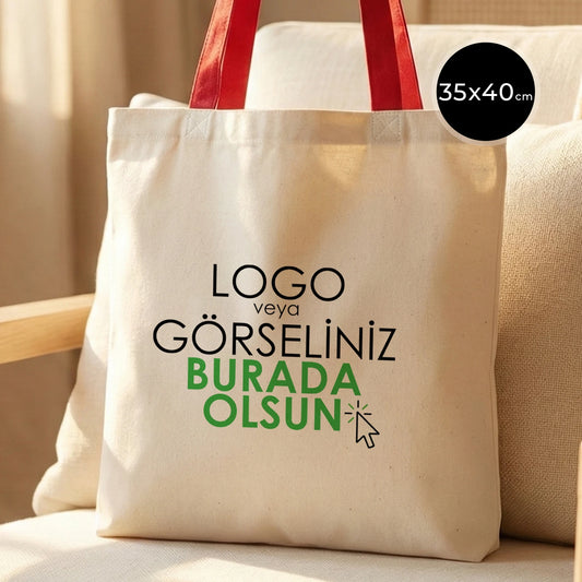 Kırmızı renkli, ham bezden üretilmiş 35x40 cm boyutlarında günlük kullanım için ideal çanta.
