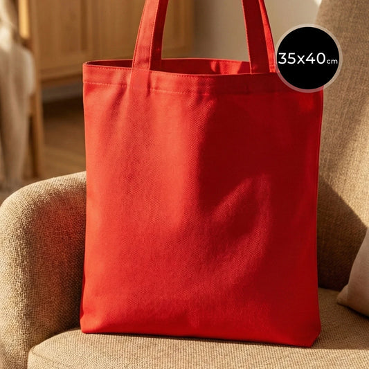 Kırmızı renkli, ham bezden üretilmiş 35x40 cm boyutlarında günlük kullanım için ideal çanta.
