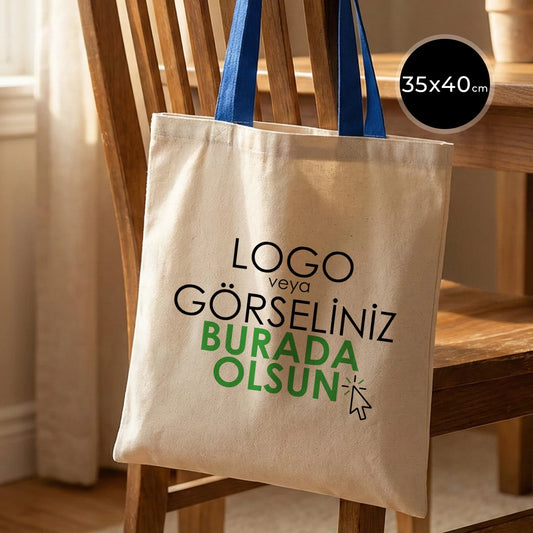 Saks mavi kulplu, ham bezden üretilmiş 35x40 cm boyutlarında günlük kullanım için ideal çanta.
