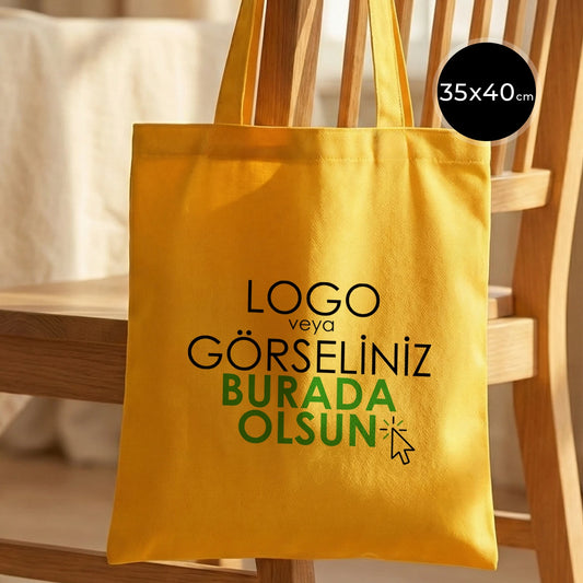 Sarı renkli, gabardin bezden üretilmiş 35x40 cm boyutlarında dayanıklı ve şık çanta.
