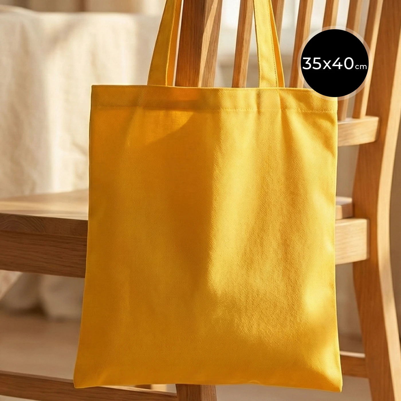 Sarı renkli, gabardin bezden üretilmiş 35x40 cm boyutlarında dayanıklı ve şık çanta.
