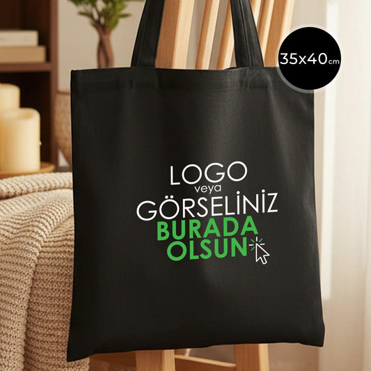 siyah ham bez çanta, 35x40 cm boyutlarında, doğal kumaş dokusu görünen sade bez çanta